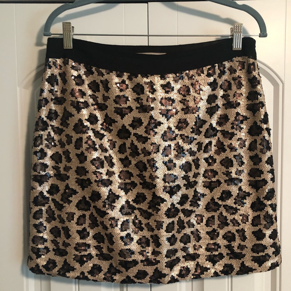 Leopard print, sequined skirt.